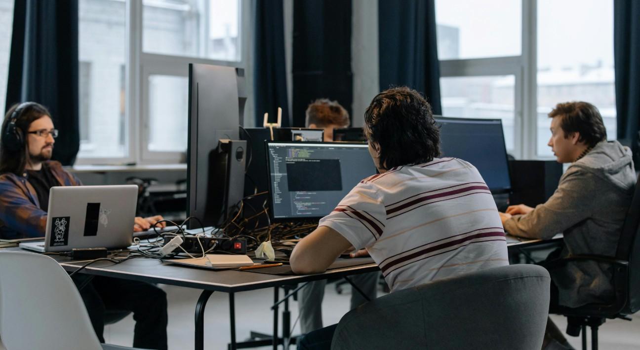 Image of software developers focused on creating revolutionary software.